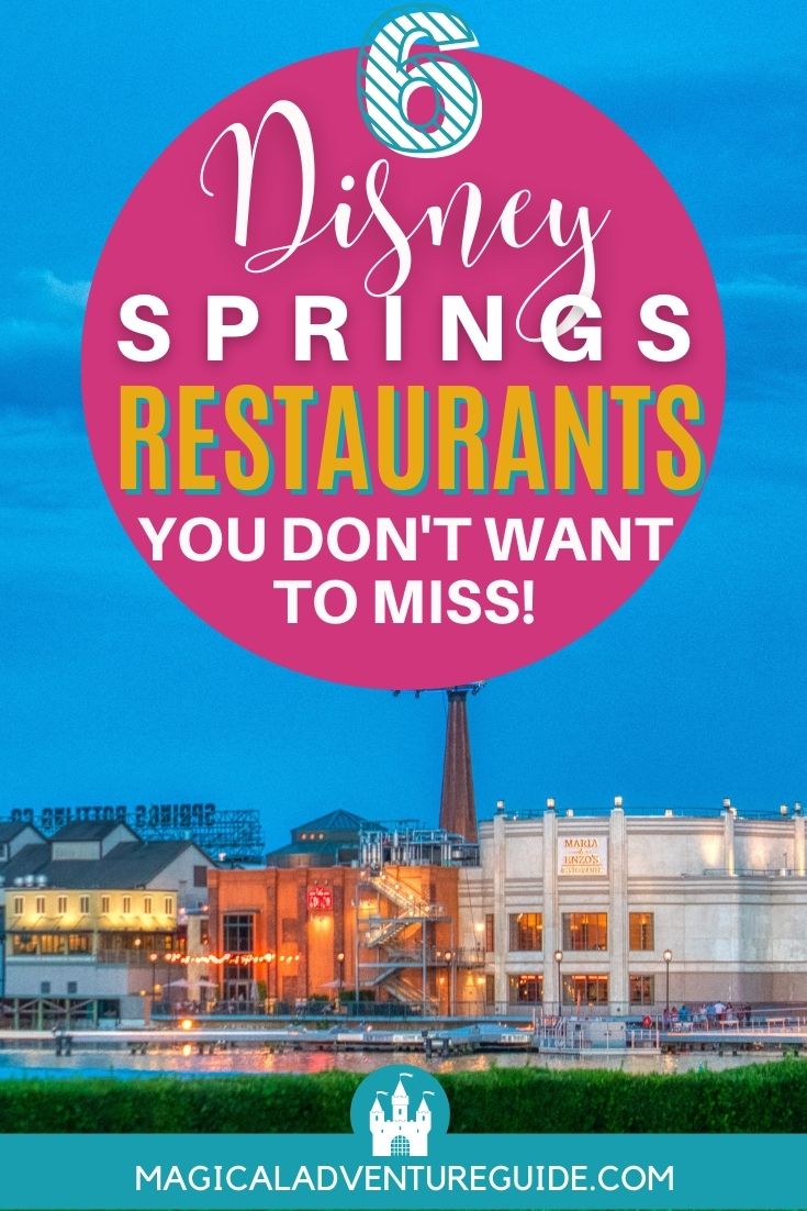 evening view of Disney Springs restaurants in a row