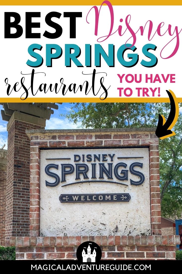 brick sign reading, "Disney Springs- Welcome"