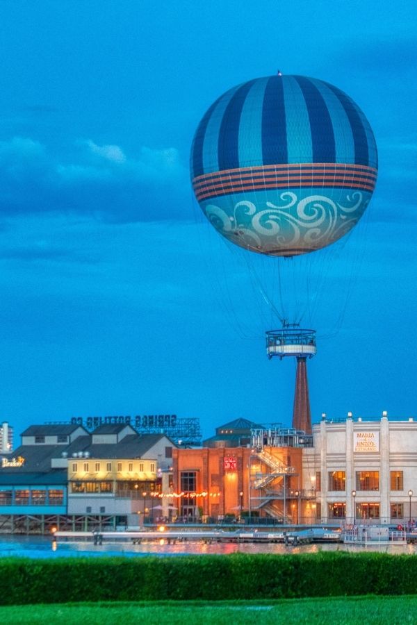evening view of several Disney Springs restaurants, including Maria and Enzo's Italian Trattoria