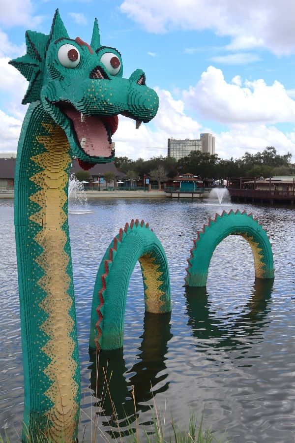 Lego dragon in the water at Disney Springs