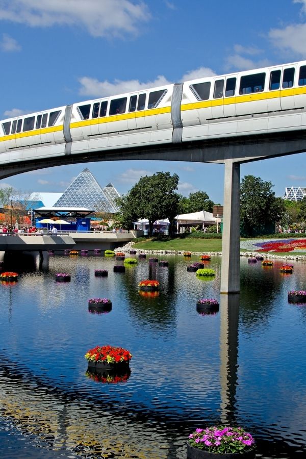 Monorail traveling through Epcot at Walt Disney World, which is one of our tips for park hopping at Disney World