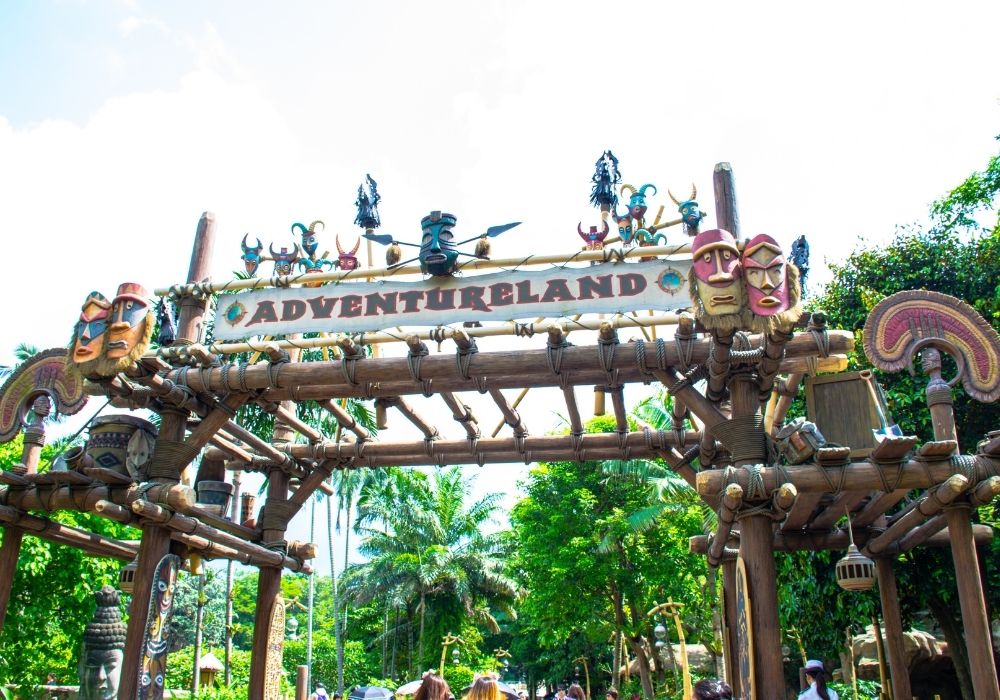 sign entering adventureland at disney world