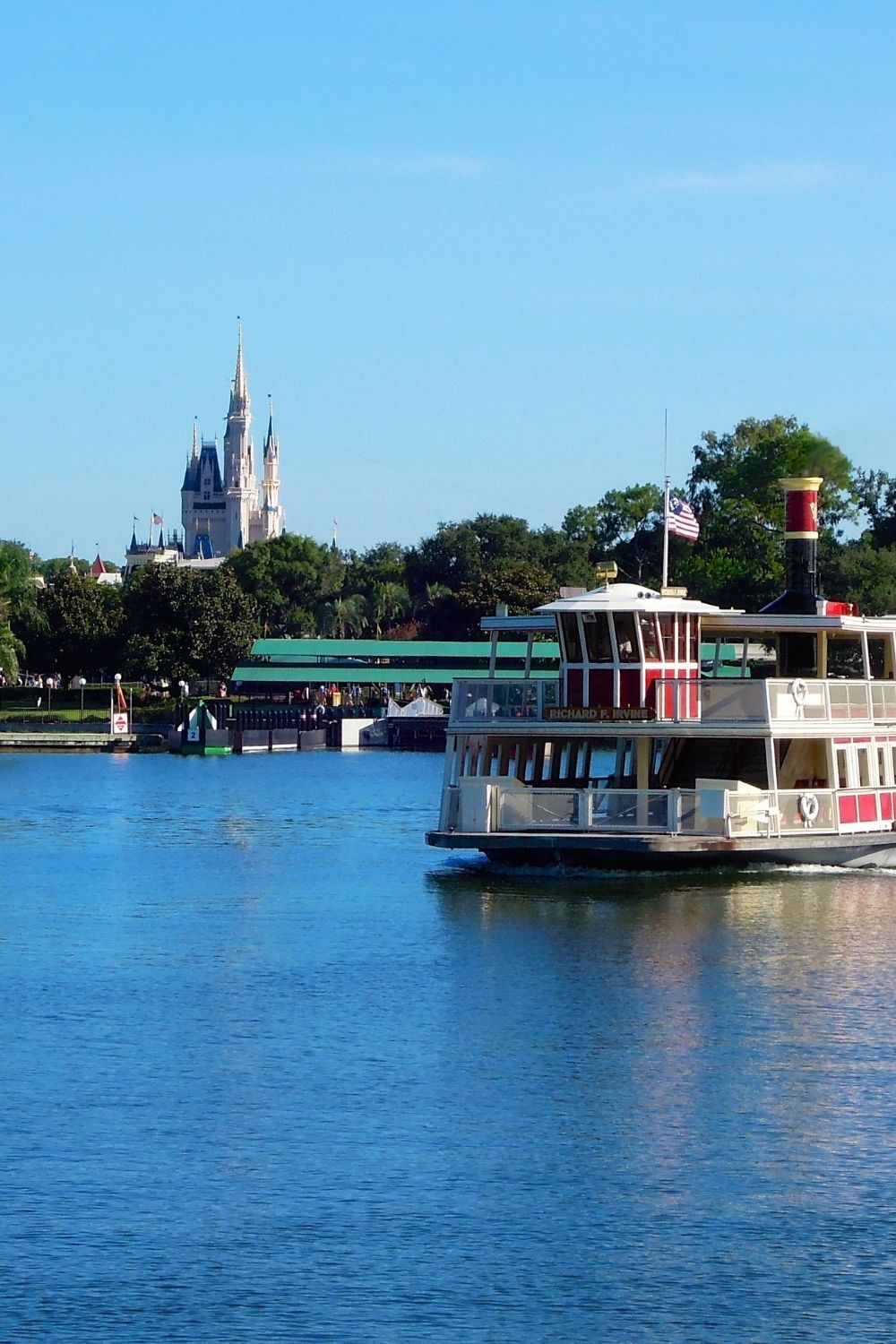the ferry goes across the seven seas lagoon in front of magic kingdom