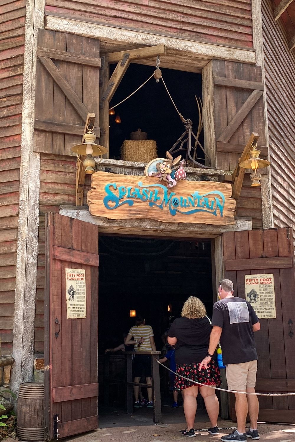 guests waiting in line at splash mountain in magic kingdom's frontierland