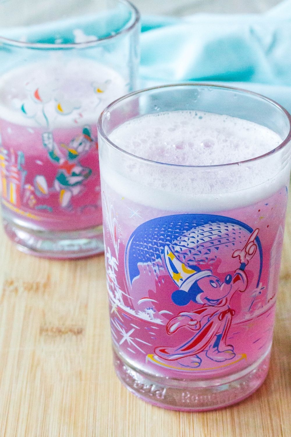 two Disney-themed glasses serving Epcot's violet lemonade made at home