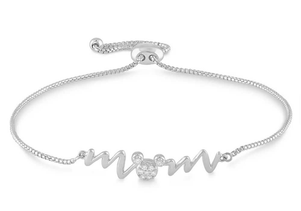 Disney mom bracelet featuring a cubic zirconia mickey shaped head as the "o" in the word.