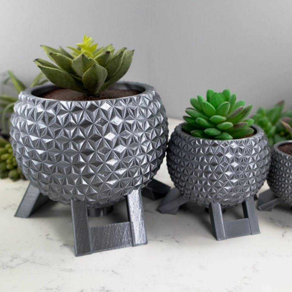 Set of planters in the shape of Spaceship Earth from Epcot