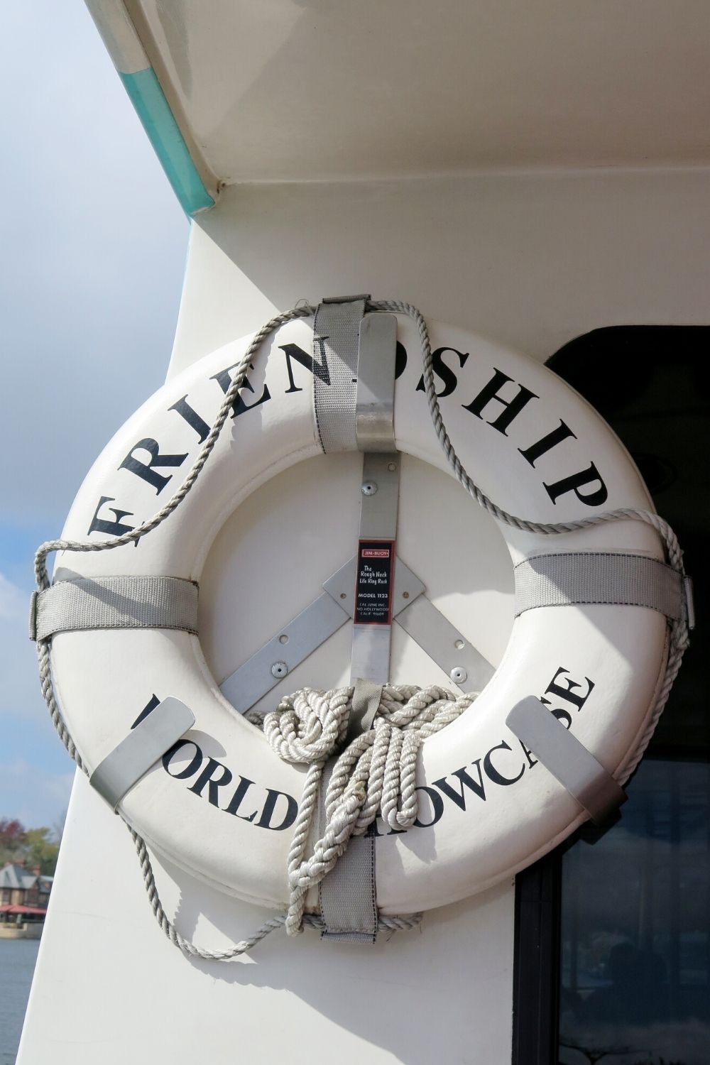 life preserver on a boat at Epcot marked "Friendship World Showcase"