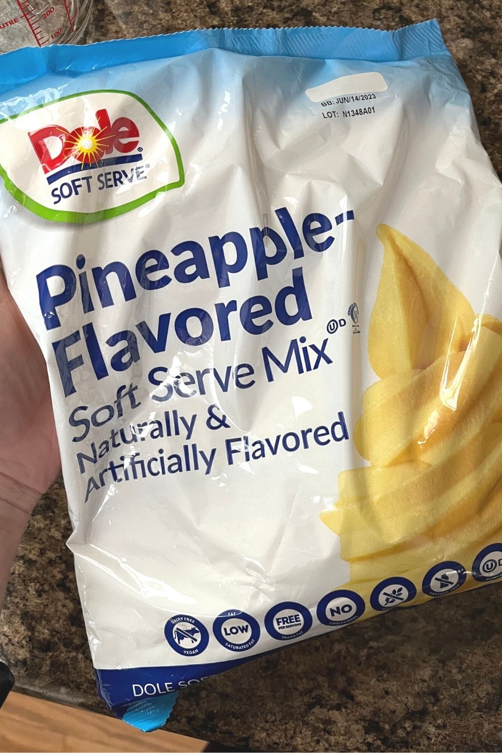 a package of Dole Pineapple Soft Serve Mix, which is used to make homemade Dole Whips
