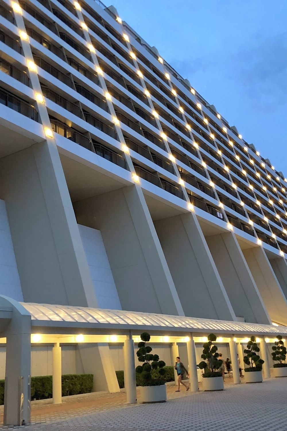 an evening view of the architecture of Disney's Contemporary Resort, which is one of the monorail hotels