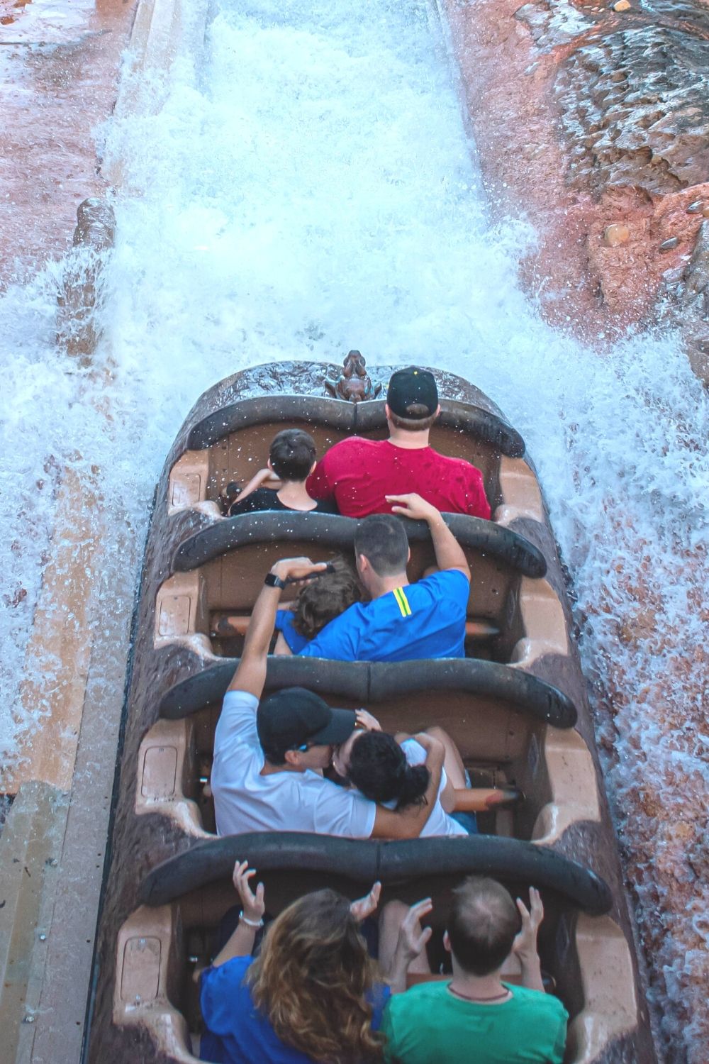 Guests riding Splash Mountain at Magic Kingdom in Disney World