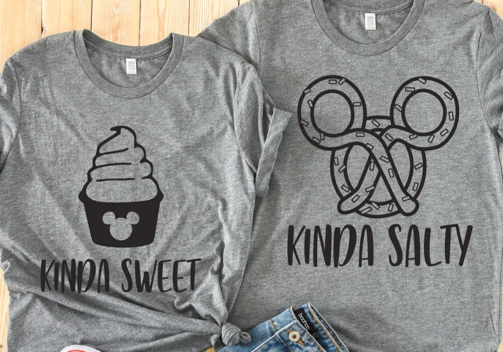 two gray couples shirts with disney snacks on them