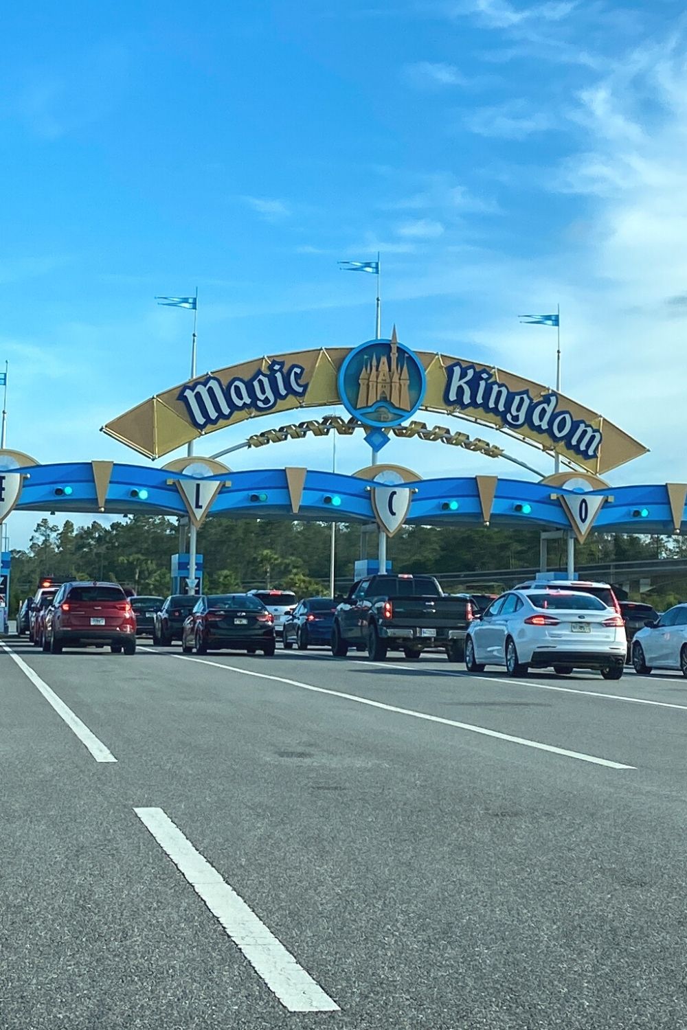 cars line up to enter the Magic Kingdom parking lot at Disney World