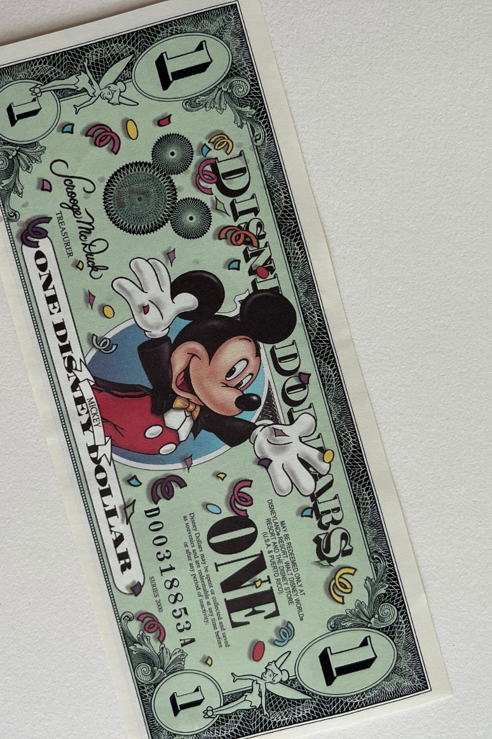close-up view of a Disney Dollar Mickey Mouse bill from 2000