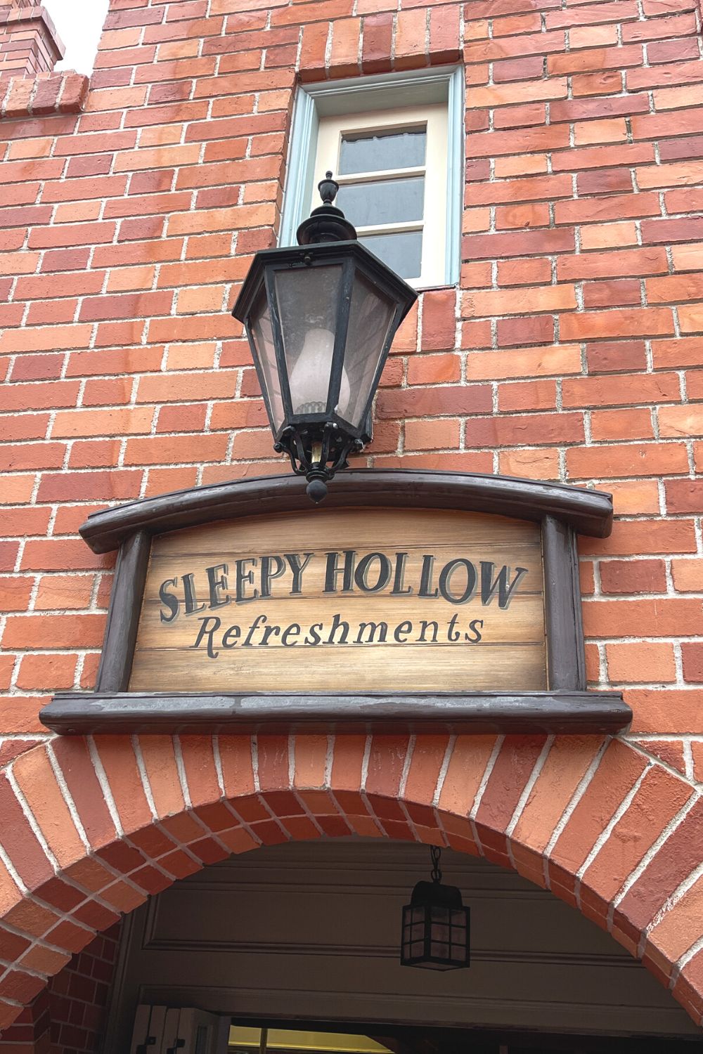 entrance to sleepy hollow refreshments at magic kingdom, a great place for waffles at disney world