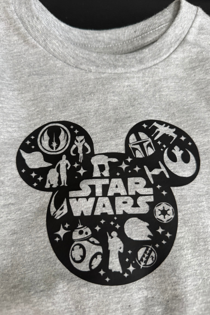 picture of a mickey head with star wars cutouts