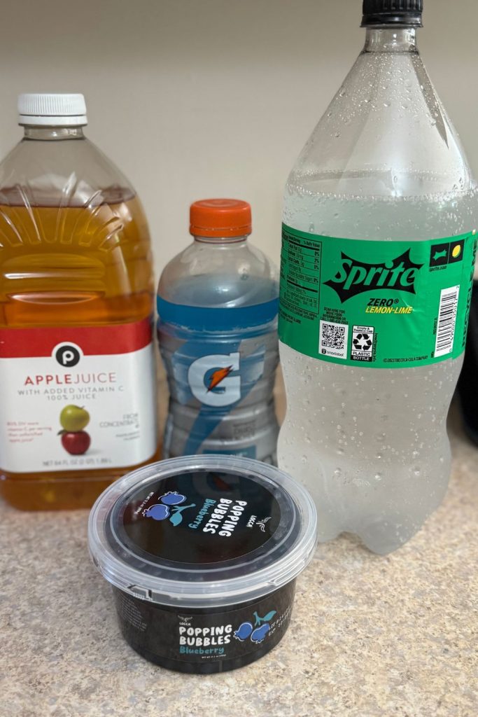 picture of sprite, gatorade, applejuice and blue boba pearls